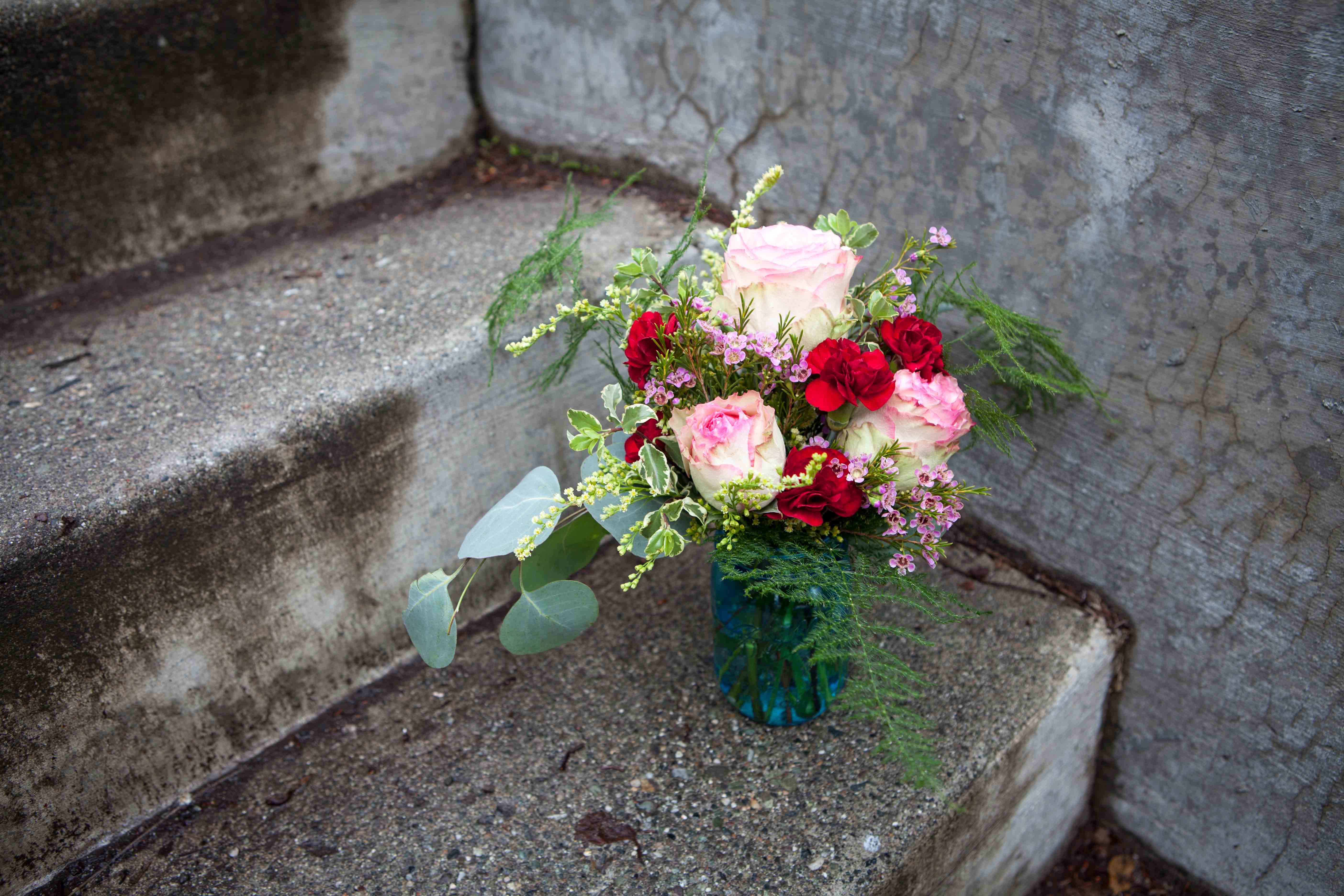 Small arrangement with mini carnations, roses, waxflower, eucalyptus, salidago and plumosa | designed by Natasha Price of Paper Peony Alaska